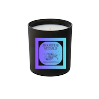 a black candle with a blue and purple label