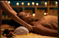 a woman getting a massage at a spa