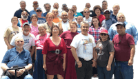 a group of people posing for a picture