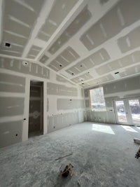 a room that is being remodeled with white walls and ceilings