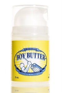 a jar of boy butter on a white background