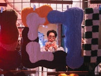 a woman is taking a picture of herself in a mirror
