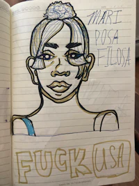 a notebook with a drawing of a woman