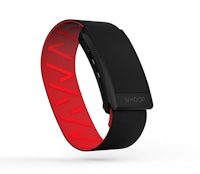 a black and red smart watch with a red strap