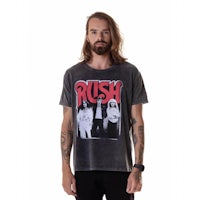 a man wearing a t - shirt that says rush