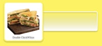 a sandwich is shown on a yellow background